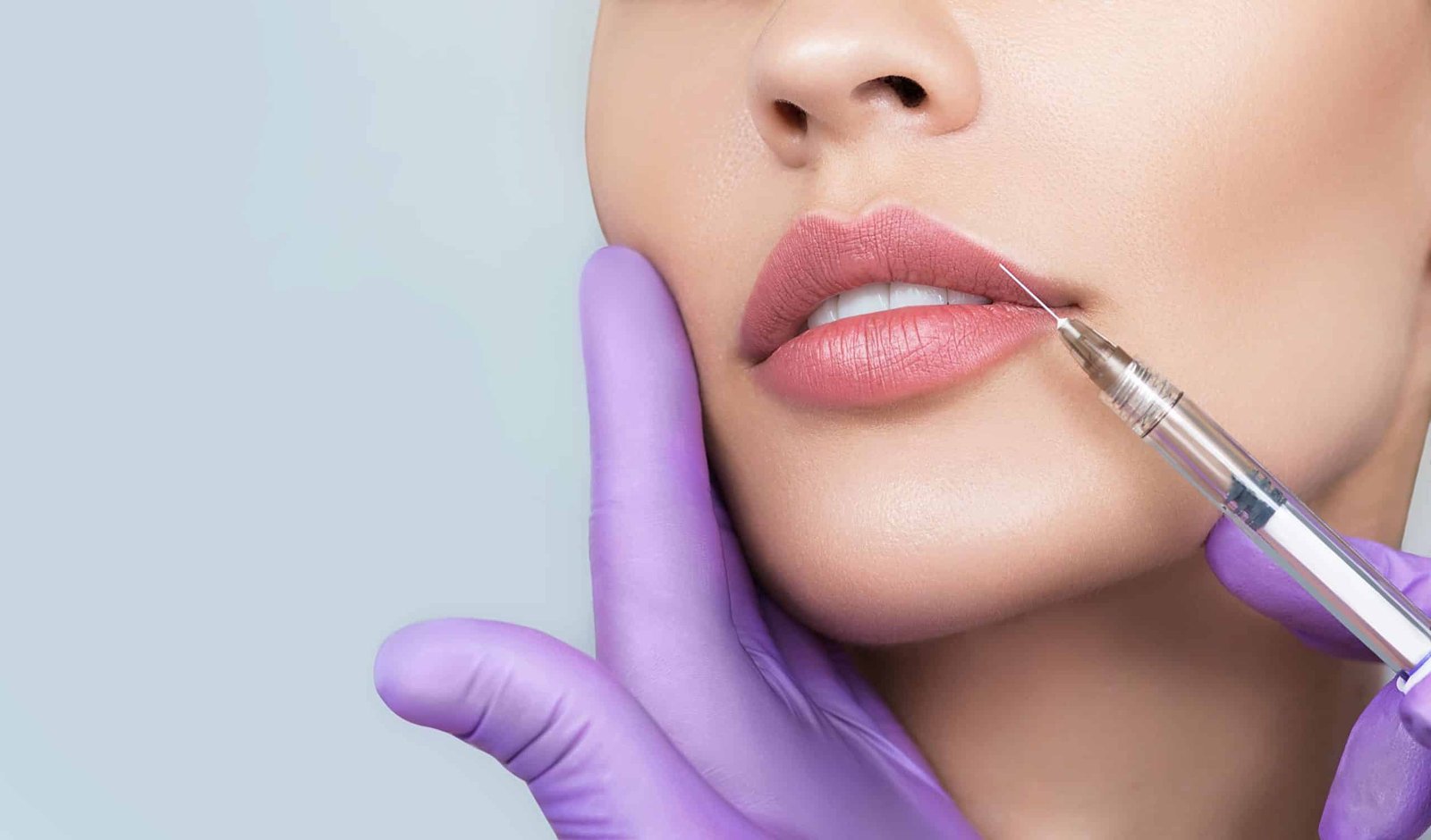 Physician performing dermal filler injection at VitalMed Clinic